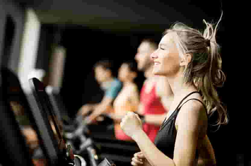 Residents Running on Treadmills in UNCOMMON Dinkytown's Fitness Center