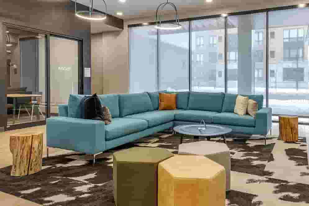 Student Lounge with Oversized Blue Sofa
