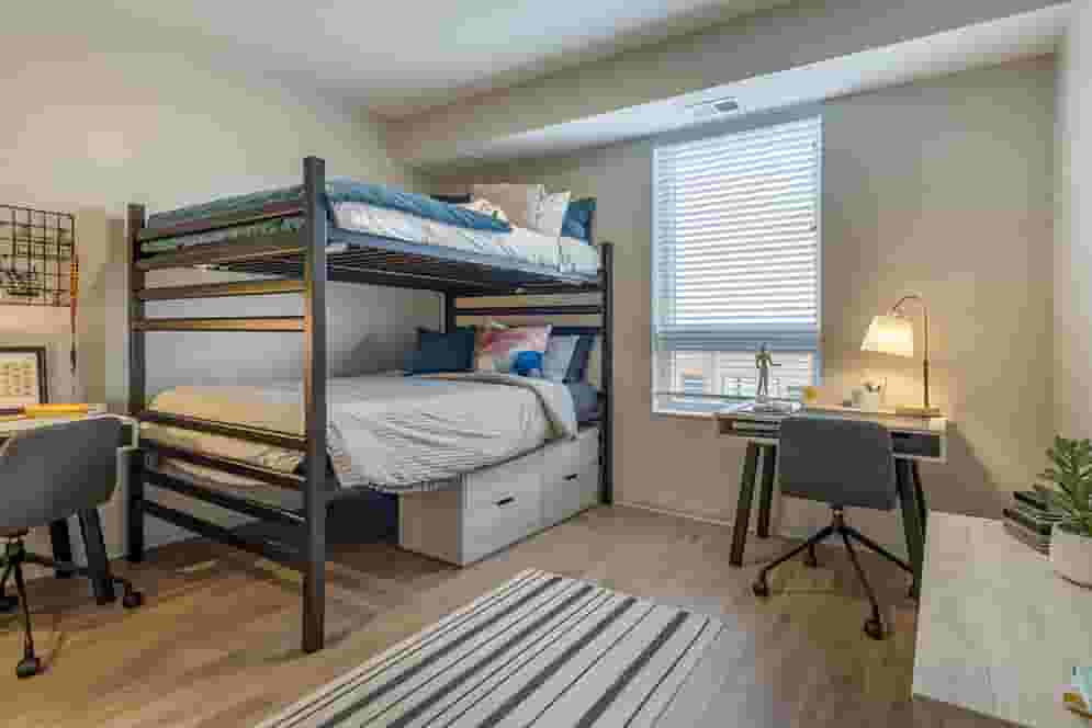 Bunk Beds and Desks shown in Student Apartment